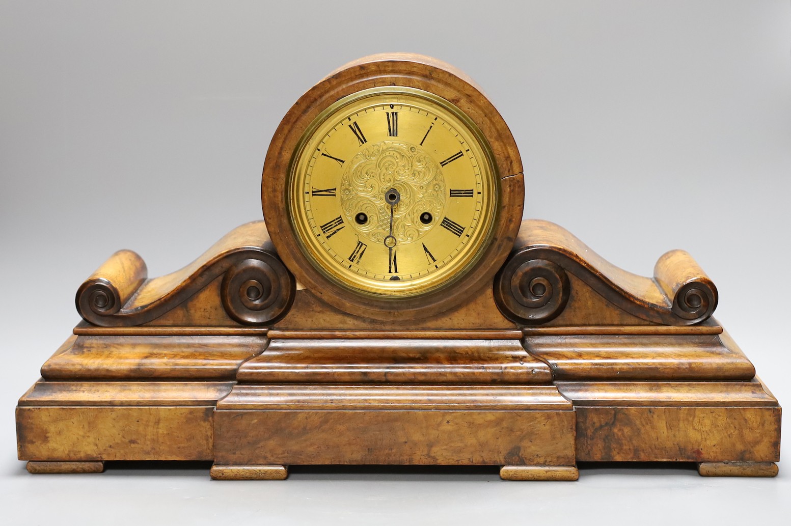 A 19th century walnut drum head mantel clock, 52 cms wide